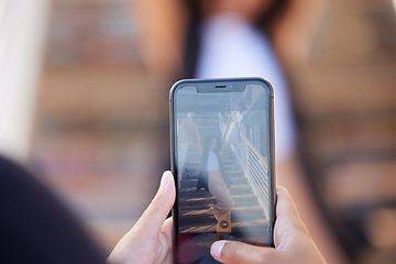 Image showing Hands, phone and picture of woman with shopping bags shopping in the city. Discount deals, sales or pov of friend taking photo of female by stairs at mall with mobile smartphone for social media post