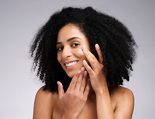 Image showing Portrait, skincare and black woman with cream, face detox and wellness on grey studio background. African American female, girl and lotion for organic facial, cosmetics and natural care for beauty.