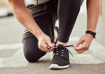 Image showing Training, fitness or hands tie shoes to start cardio workout or sports exercise on ground or city road. Legs, runner or healthy sports man with running shoes or footwear laces ready for body goals