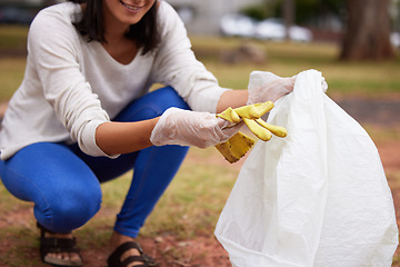 Image showing Sustainability, pollution and woman cleaning a park for earth day, eco friendly and ecology in Costa Rica. Recycle, charity and volunteer picking up trash for service, clean energy and work in nature