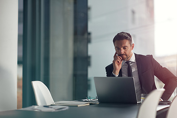 Image showing Laptop, thinking and office with a businessman working on research for future company growth. Computer, idea and innovation with a male employee or manager in a boardroom with review his strategy