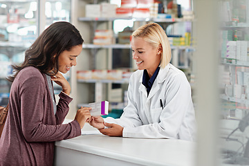 Image showing Happy, customer and pharmacist with healthcare medicine assistance, help and expertise at store counter. Advice and opinion of worker helping girl with medication information at pharmacy.