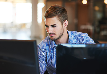 Image showing Business man, confused and working in information technology, computer system upgrade and software development. Focus, IT worker with tech glitch, 404 with internet connectivity fail and programming