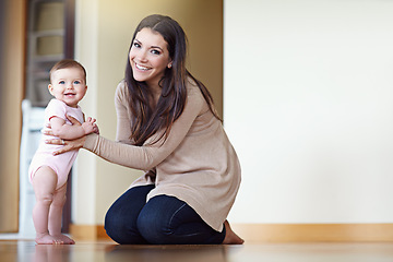 Image showing Mother, family and baby for learning to walk for development and growth with help and support. Portrait of woman and child in house to play with love, security and care with a smile while walking