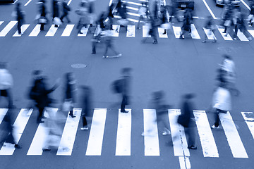 Image showing People crossing the street-blue tones