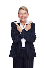 Image showing Happy, elderly and portrait of woman pointing fingers isolated on white background in a studio. Direction, showing and smile of a senior business executive with a confident hand gesture on a backdrop