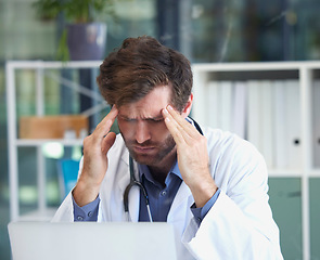 Image showing Headache, burnout or doctor with stress in a hospital thinking of emergency, medical deadline or pressure. Migraine, man or healthcare worker frustrated with mental health problems or work anxiety