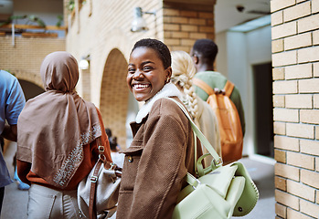 Image showing Black woman, happy or portrait on university, school or college campus with friends, people or global study group. Smile, face or diversity students walking to education class or learning buildings