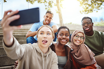 Image showing Students, funny faces or phone selfie on university steps, college campus or school bleachers for social media. Smile, happy or diversity friends on mobile photography technology for profile picture