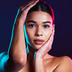 Image showing Beauty, neon shadow light and portrait of woman with dark lighting, facial cosmetics and skincare glow. Luxury studio makeup, aesthetic creativity and face model with creative pink blue color design