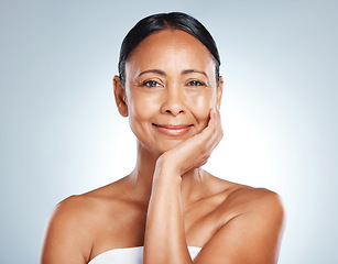 Image showing Elderly woman, face and portrait with smile in beauty mockup, skincare for anti aging isolated on studio background. Dermatology, botox and healthy skin with facial wellness and cosmetic care