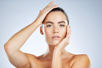 Image showing Beauty, skincare cosmetics and portrait of a woman isolated on a grey studio background. Glow, clean and face of a spa dermatology model with facial health, hydration and wellness on a backdrop