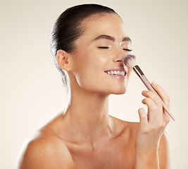 Image showing Brush for makeup, face and smile with woman in beauty mockup, skincare with cosmetics isolated on studio background. Happiness, glow and cosmetic tools, healthy skin and wellness with microblading