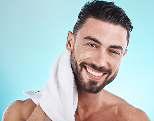 Image showing Shower towel, portrait and man cleaning face for morning dermatology treatment, luxury bathroom routine or beauty self care. Spa salon, wellness and model with facial healthcare, skincare and hygiene