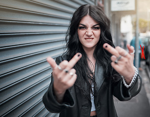 Image showing Face portrait, middle finger and woman in city with rude gesture or insult. Punk fashion, goth and female in street with anger, aggressive and bad hands sign, symbol or emoji for conflict expression