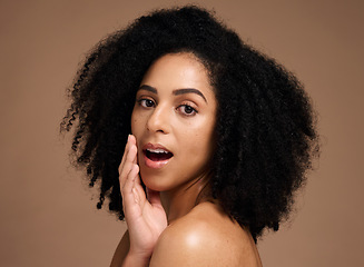 Image showing Face, beauty and black woman with skincare secret in studio on a brown background. Makeup cosmetics, portrait and young female model with glowing, healthy and flawless skin after spa facial treatment