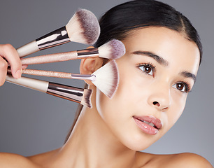 Image showing Woman, face beauty and makeup tools for skincare wellness, cosmetics dermatology and luxury salon product vision. Model, facial care and application brush for self care grooming and youth lifestyle