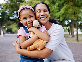 Image showing Portrait, mother and child hug in park, fun day outdoor with love and care, happy people together in nature. Family, happiness and bonding with childhood, woman with girl on adventure with smile