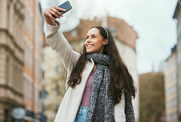 Image showing Travel, phone or woman takes a selfie for social media in city of Paris walking on a relaxing holiday vacation or weekend. Smile, pride or happy girl tourist taking fun pictures alone to post online