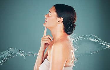 Image showing Skincare, beauty and water splash on woman washing body for hygiene and hydration isolated in a studio background. Self care, grooming and female dermatology for young beautiful adult