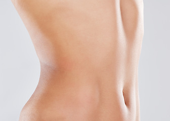 Image showing Woman, stomach and slimming wellness or skincare for plastic surgery, liposuction or digestion nutrition in white background. Model, belly and tummy tuck or cosmetics dermatology healthcare in studio