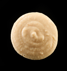 Image showing hummus on black background