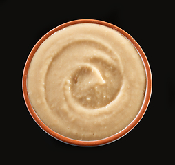 Image showing hummus on black background