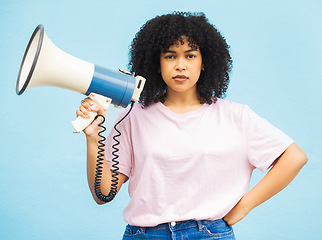 Image showing Megaphone announcement, serious and portrait of black woman protest for democracy vote, justice or human rights rally. Racism speech, microphone noise and studio speaker isolated on blue background