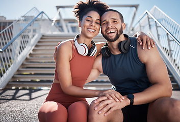 Image showing Friends, fitness and portrait smile with hug in the city for break from running exercise, training or workout on steps. Happy man and woman smiling in relax for healthy cardio exercising outside