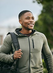 Image showing Fitness, travel or happy black man walking to gym for training, exercise or workout with duffle bag in Atlanta. Pride, mindset or healthy sports athlete smiles with body goals, motivation or mission
