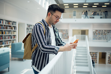 Image showing Smartphone, library and student on university, education or college website, internet search and school learning faq, about us or contact. Campus, bookshelf and geek man using phone for social media