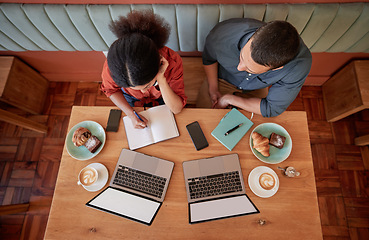 Image showing Working, coffee shop and laptops with mockup and business worker group planning a strategy. Table top, above and cafe work of a web design staff working on a ecommerce designer innovation project