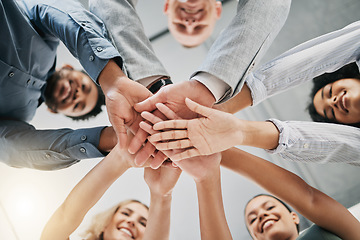 Image showing Team building, hands or happy business people with support, mission or goals for success in office building. Low angle, meeting or employees in partnership working with hope, team work or motivation