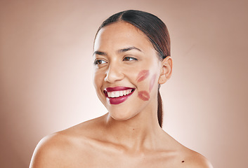 Image showing Beauty, makeup and woman with lipstick and cosmetics on a studio background for dermatology, fashion and salon mockup. Face and headshot of aesthetic female model with a smile, glow and healthy skin