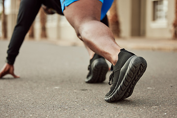 Image showing Runner, fitness or black man ready to start running exercise, cardio sprinting workout or sports training on city road. Back view, focus or healthy African athlete with mission, mindset or body goals