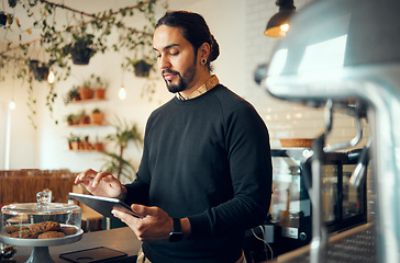 Image showing Startup cafe manager man with tablet for social media, networking or company blog content review. Focus, search or coffee shop employee with tech for social network, research or internet mobile app