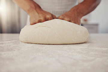 Image showing Man hands and cook kneading dough for baking preparation work and process at culinary counter. Restaurant chef and worker in professional kitchen preparing wheat bread or pizza recipe.