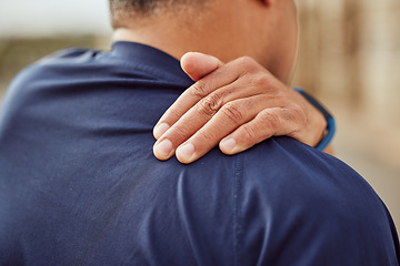 Image showing Fitness, back pain and man with hand on shoulder muscle for support, massage and relief during exercise or workout. Health, sports training and wellness and painful sports injury with hands on back.