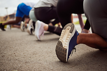 Image showing Shoes, fitness or people at the start of a marathon race with performance goals in workout or runners exercise. Back view or healthy group of sports athletes ready for running contest on city road