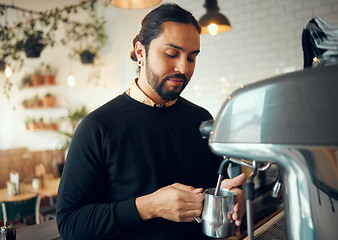 Image showing Small business, cafe barista and man working on morning espresso machine in a restaurant. Waiter, milk foam and breakfast latte of a worker from Brazil busy with drink order service as store manager