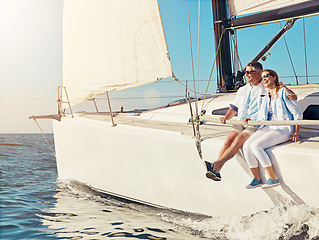 Image showing Luxury cruise, couple and yacht while on a boat trip at sea for a adventure, holiday or vacation in summer. Man and woman sailing together on a cruise ship on the ocean with love, happiness and care