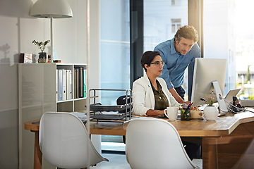 Image showing Finance, man and woman with computer, conversation and trading for investments, accountant or fintech in modern office. Traders, male leader or female employee with online reading, profit or training