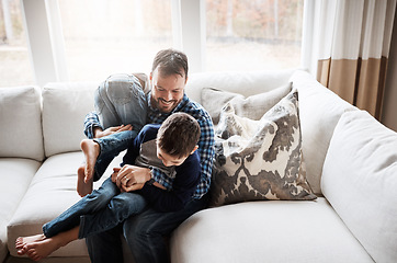 Image showing Father, children and play together on sofa for bonding, relax fun and happiness energy in family home. Parent, happy kids and playful smile on couch in living room for love or funny quality time