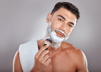 Image showing Man, portrait and shave foam for cleaning, grooming hygiene and skincare wellness or cosmetics treatment. Shaving brush, facial cream and dermatology skin or beard cleansing for face hair removal