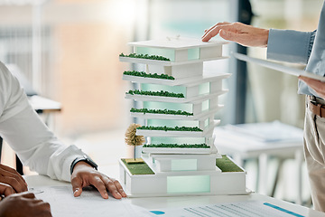 Image showing Building model, diversity and hands of architect working on real estate development, architecture engineering or planning. Project management, teamwork collaboration and woman review 3d house design