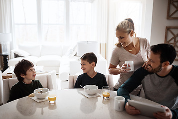 Image showing Family, children and breakfast with a mother, father and boy siblings sitting around a table in the morning. Kids, love or bonding with a son, brother and parents enjoying a meal in the home together