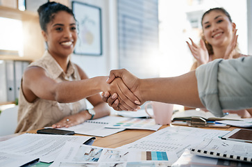 Image showing Meeting, handshake and collaboration with a business black woman in the office for a deal or agreement. Teamwork, collaboration and thank you with a female employee shaking hands with a colleague