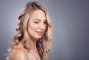 Image showing Beauty, skincare and hair care, woman in studio with luxury makeup and care for healthy and clean hairstyle. Health, wellness and beautiful model girl with blonde salon hair style on grey background.