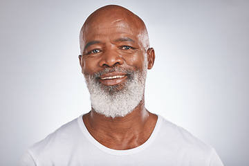 Image showing Senior black man, face and self care with skincare, dermatology and cosmetics for clean, glow and fresh skin. Headshot of African male with a beard on grey studio background for beauty spa treatment