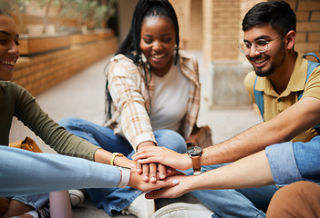 Image showing Hands, group and teamwork of students in university for collaboration, unity or motivation. Support, solidarity and people or friends huddle for education goals, learning targets or team building.